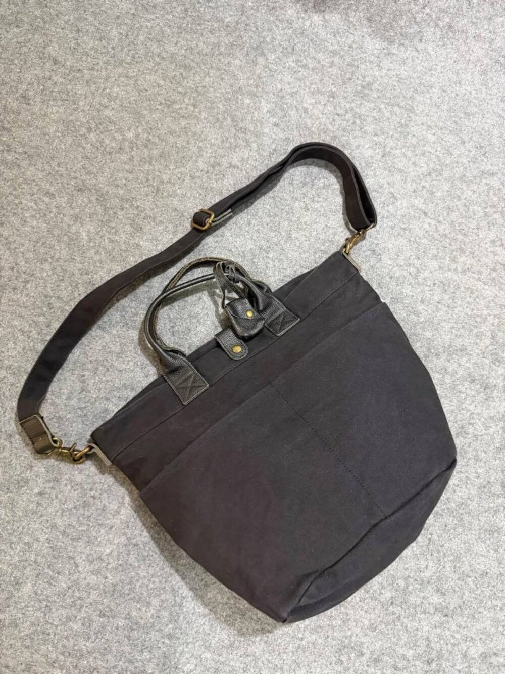 Black Minimalist Tote Bag with Top Handles and Adjustable Shoulder Strap - Picture 2 of 5